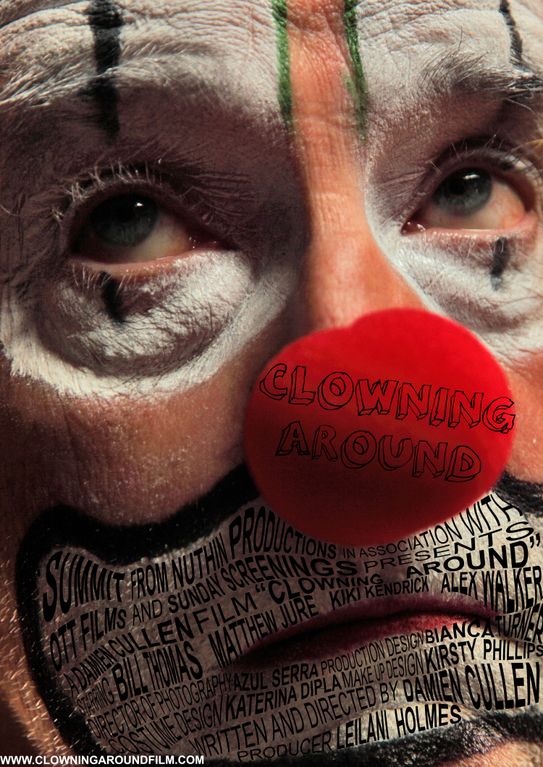 A man with a clown mask on his face.